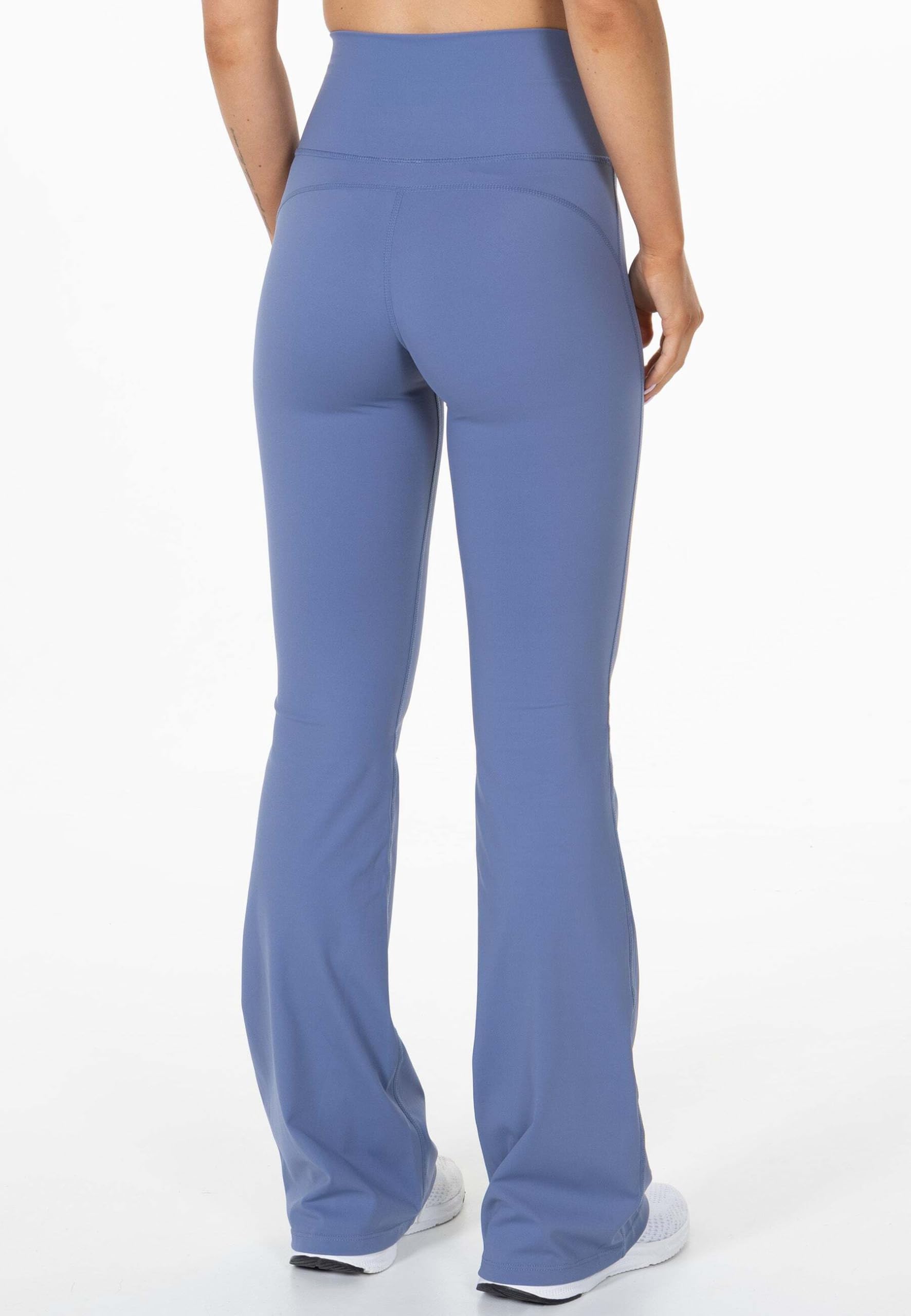 Divina Flare Tights, legginsy z rozkloszowanymi nogawkami i paskiem cross-over, idealne do treningu, jogi, spacerów i codziennego noszenia. Niebieskie M