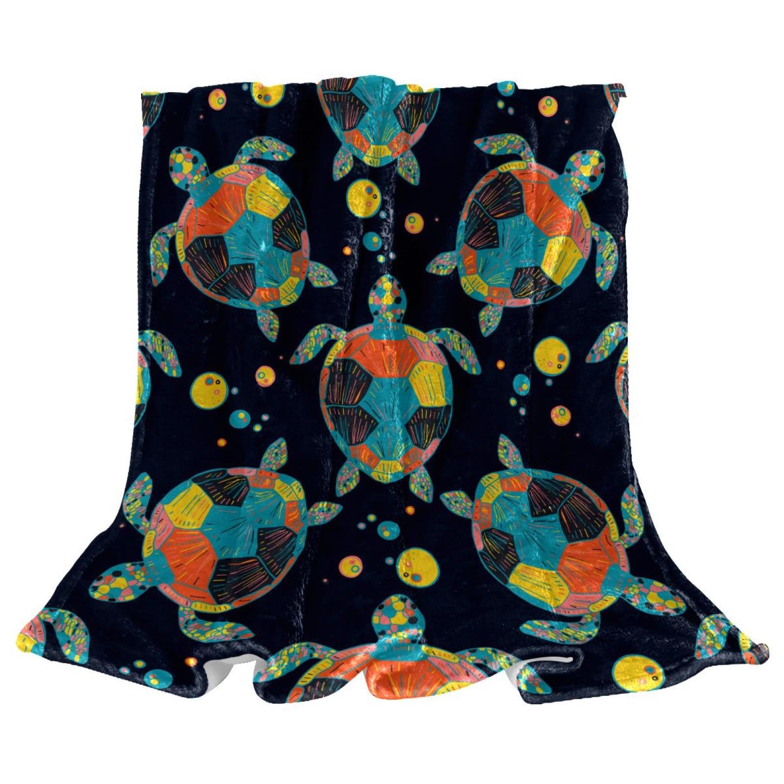 Couverture polaire tortue de mer pour stopper le froid sur le canapé