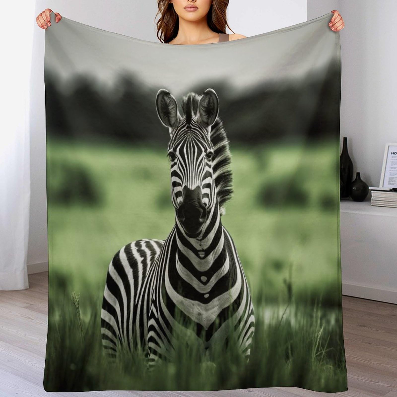 Couverture en polaire flannel zèbre légère contre le froid sur lit