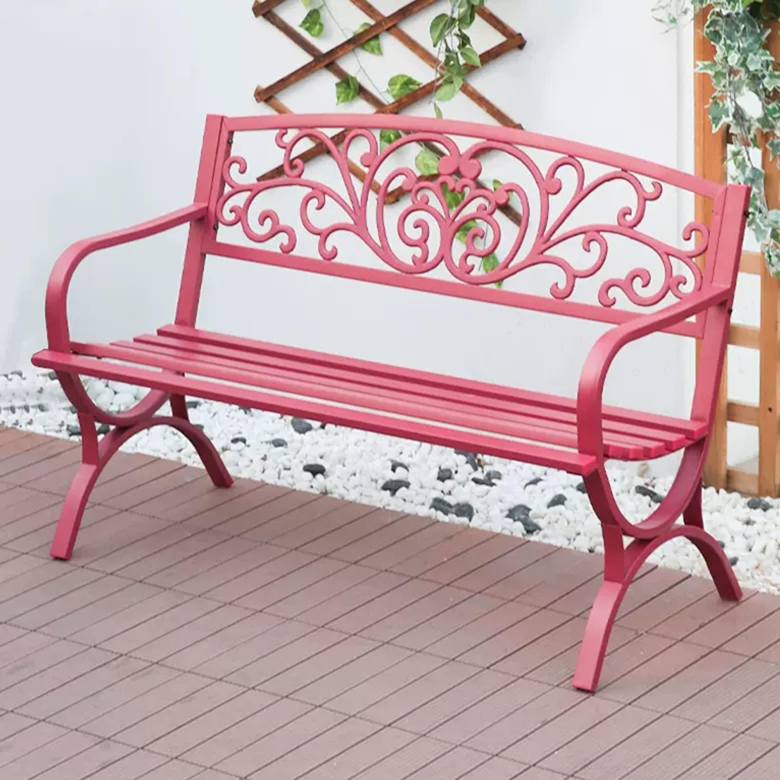 Banco de jardín de metal rojo con respaldo floral exterior