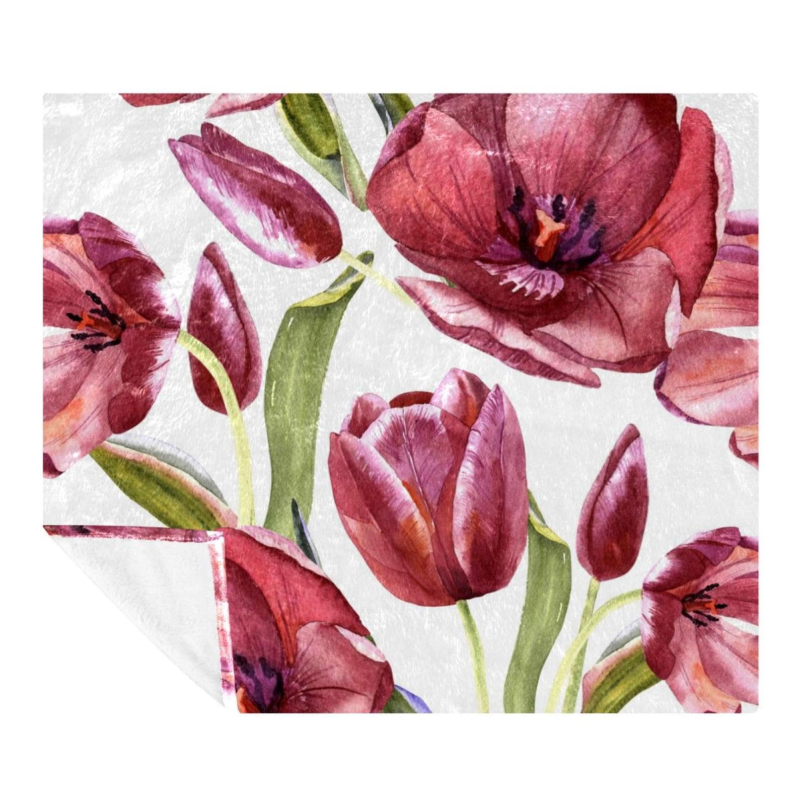 Plaid microfibre tulipe pour s'envelopper de douceur sur le canapé ou en voyage