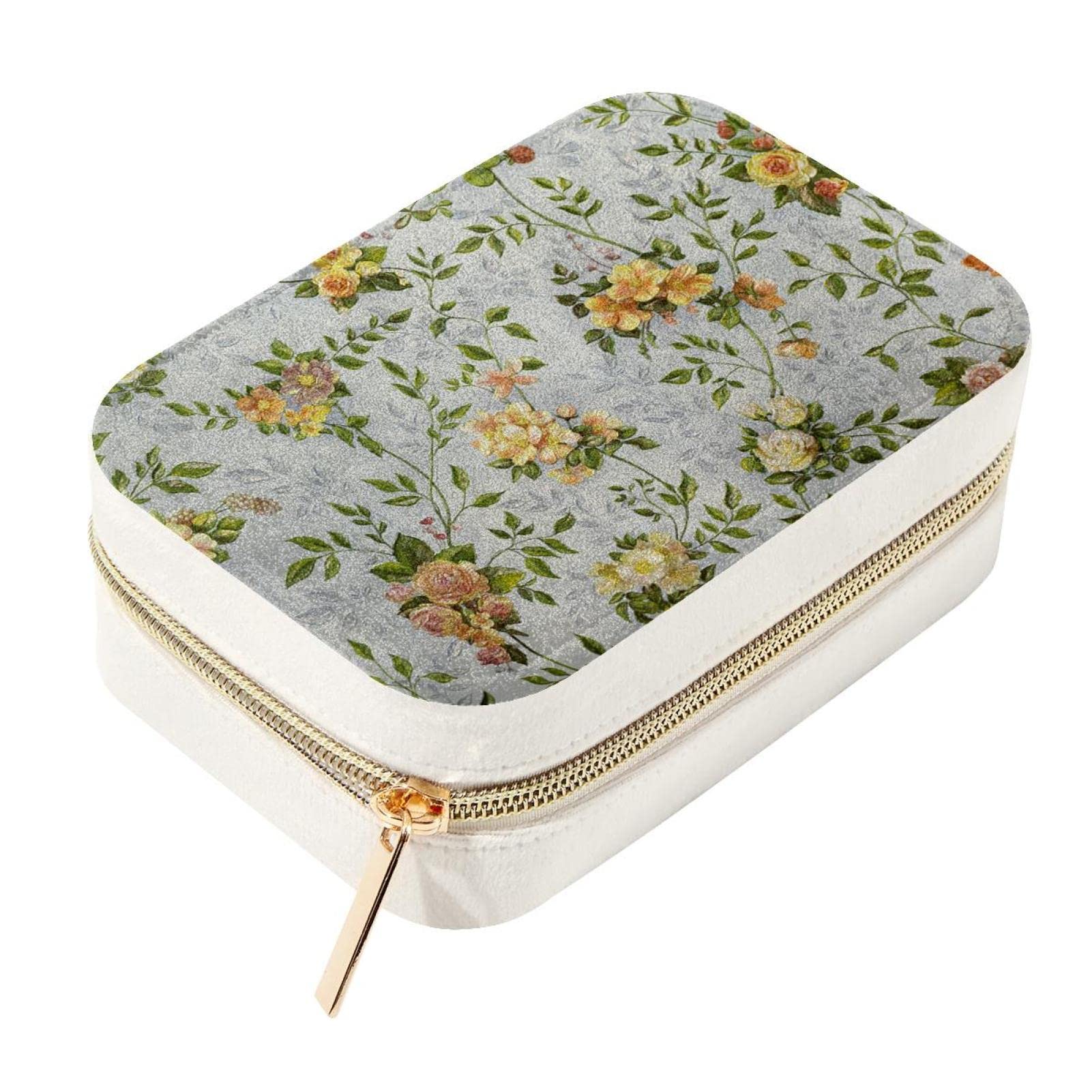 Boîte à bijoux portable en velours et détails feuilles de luxe