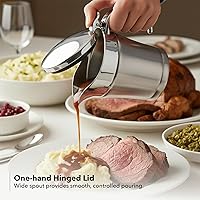 Vista 4 de OVENTE Salsa de acero inoxidable con tapa con bisagras, jarra de salsa aislada de 14 onzas para servir crema, aderezo de ensalada o jarabe en Acción