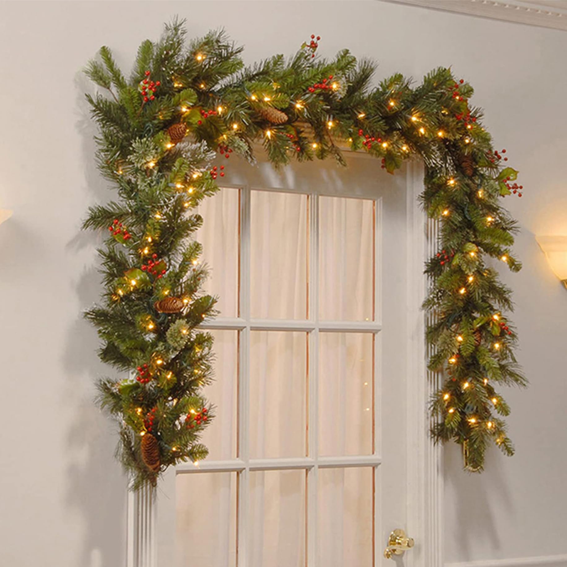 CAKEEYUM Christmas Garland, 9ft 50LED Prelit Christmas Garland, Artificial Lighted with Pine Cones ＆ Red Berries, Battery Operated for Mantle, Prelit Chris