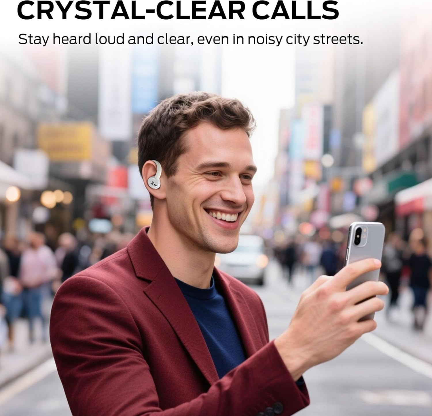 Man making a call with Monster N-Lite 216 earbuds in a city environment