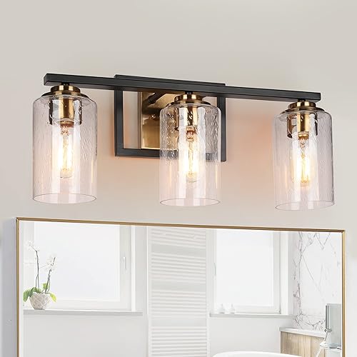 ZEVNI Lámpara de tocador de baño de oro negro, 3 luces modernas con pantallas de vidrio sembrado, 20 x 9 x 6 pulgadas