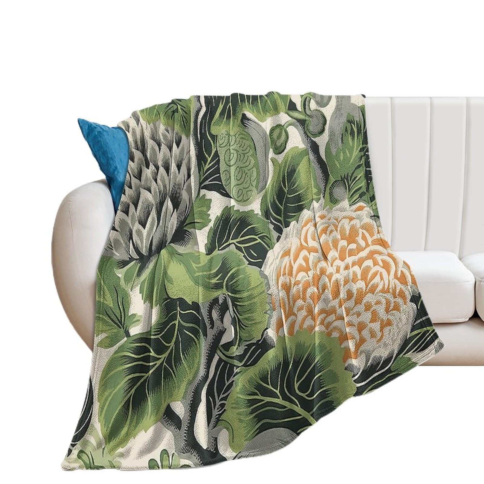 Couverture polaire verte et blanche pour un canapé design et cocooning