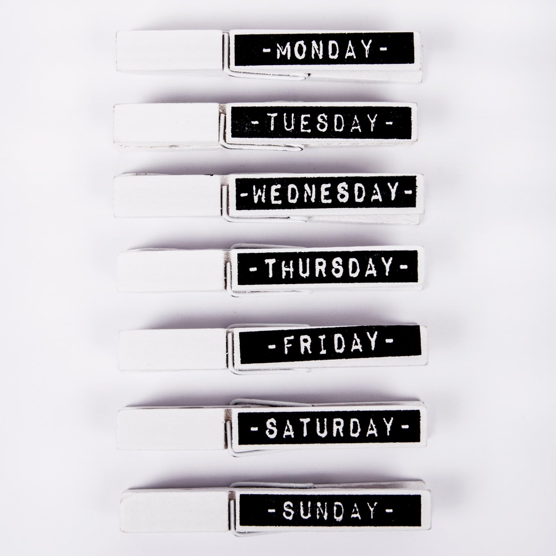 Memo clips, paper clips, note clips, weekdays, week, white.