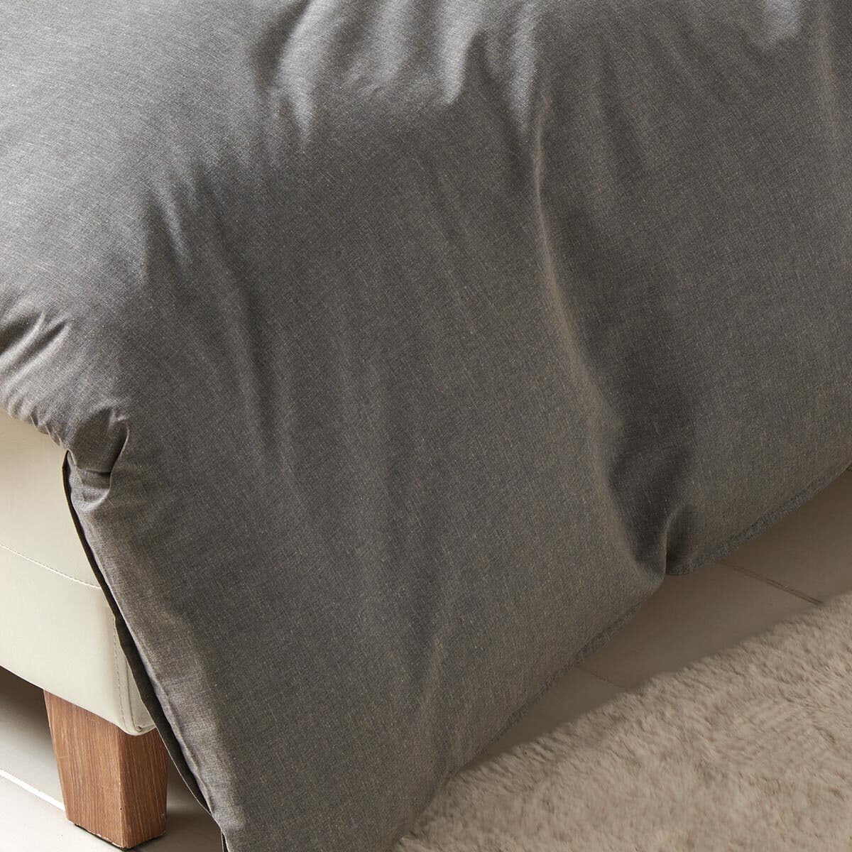 Traumschlaf Melange Bettwäsche Uni – Pflegeleichte im modernen Melange Look – ideal für Sommer wie Winter – weich & hautfreundlich, mit Reißverschluss – 135x200 cm + 80x80 cm, anthrazit