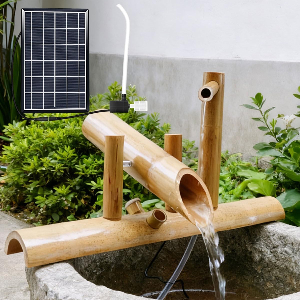 Fuente de agua mecedora solar para crear un rincón zen en el patio