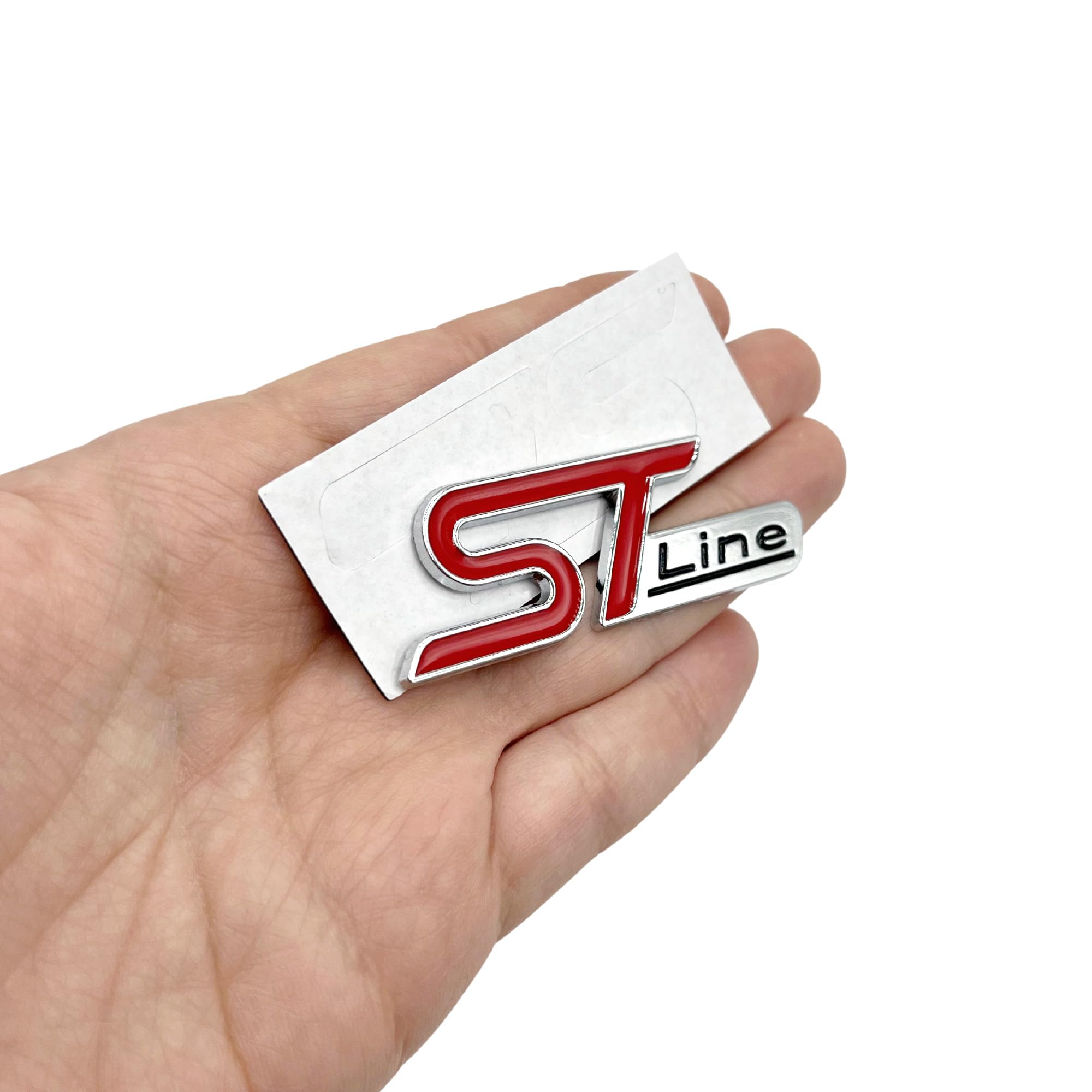 AUTOZOCO Adesivo ST Line, stemma ST, adatto per laterali, compatibile con Ford, materiale metallico, 6 cm larghezza x 2,1 cm altezza, argento
