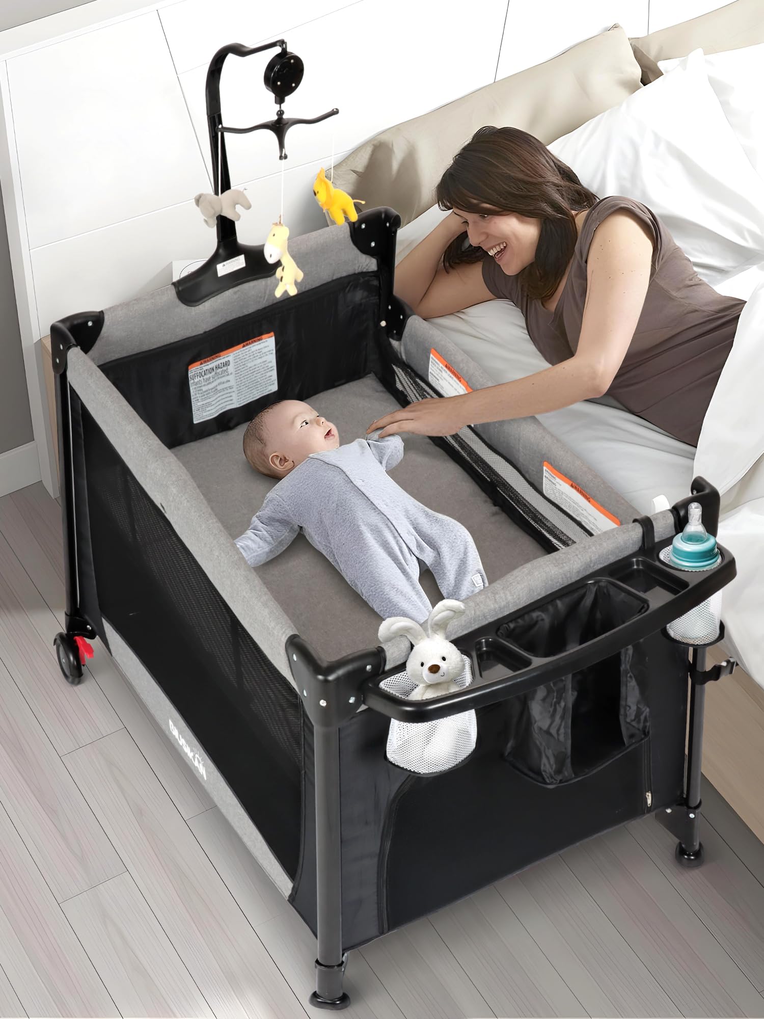 BIUSIKAN Baby Bassinet, Pack and Play with Bassinet, Bedside Sleeper with Diaper Changer, Mosquito Net, Music Box, Portable Crib with One-Click