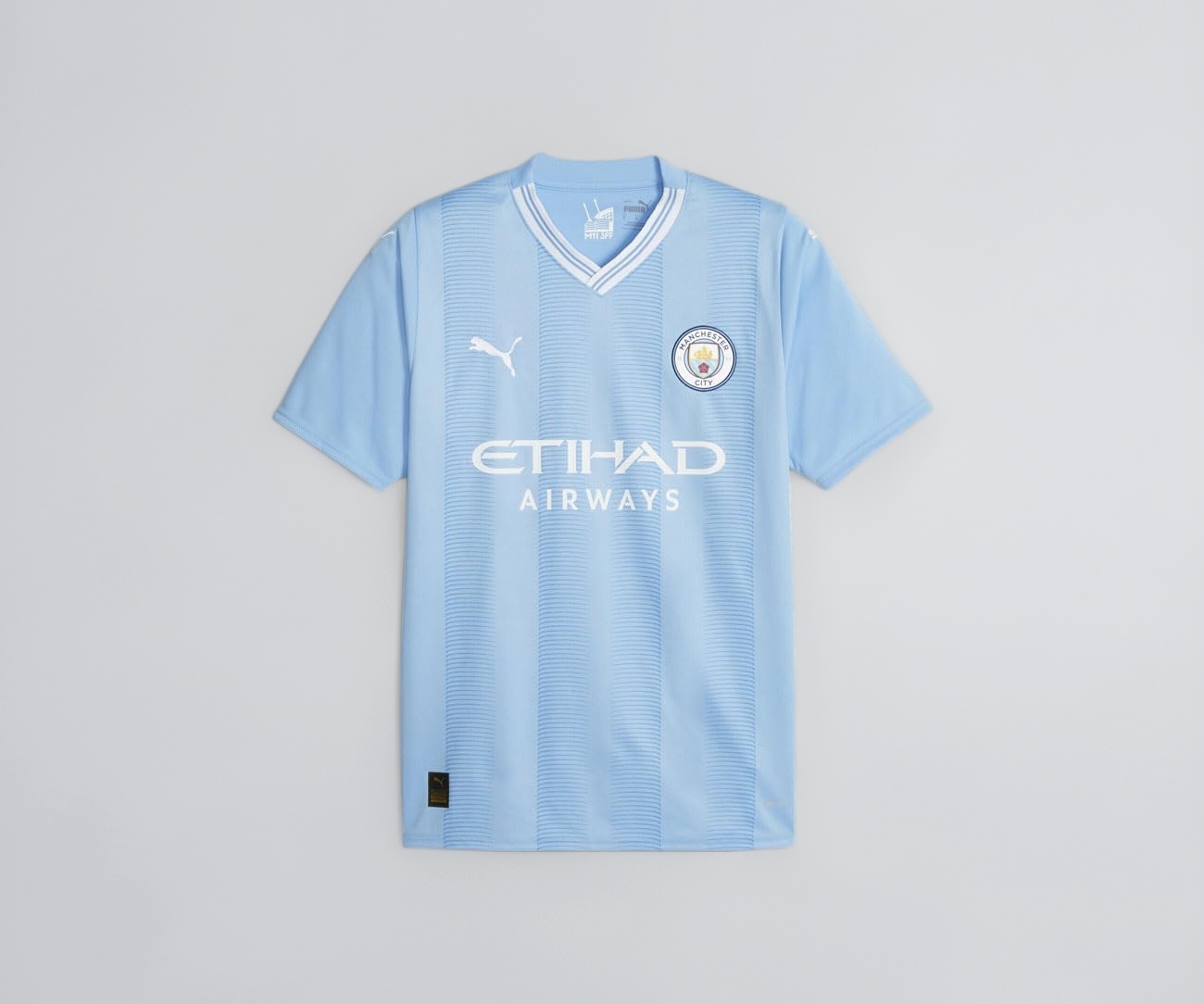 PUMA Men's Soccer Manchester City 23/24 Home Jersey - Celebrate