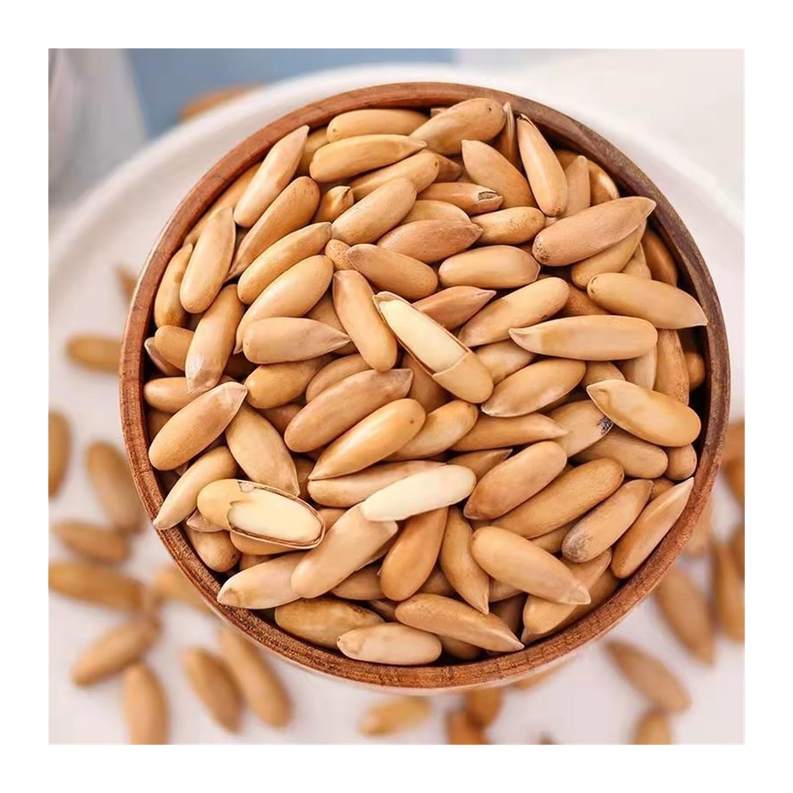 250 g brasilianische Pinienkerne, dünnschalig, fleischig, knackig und mit Pinienduft, mit einem reichen nussigen Aroma.(2pcs)