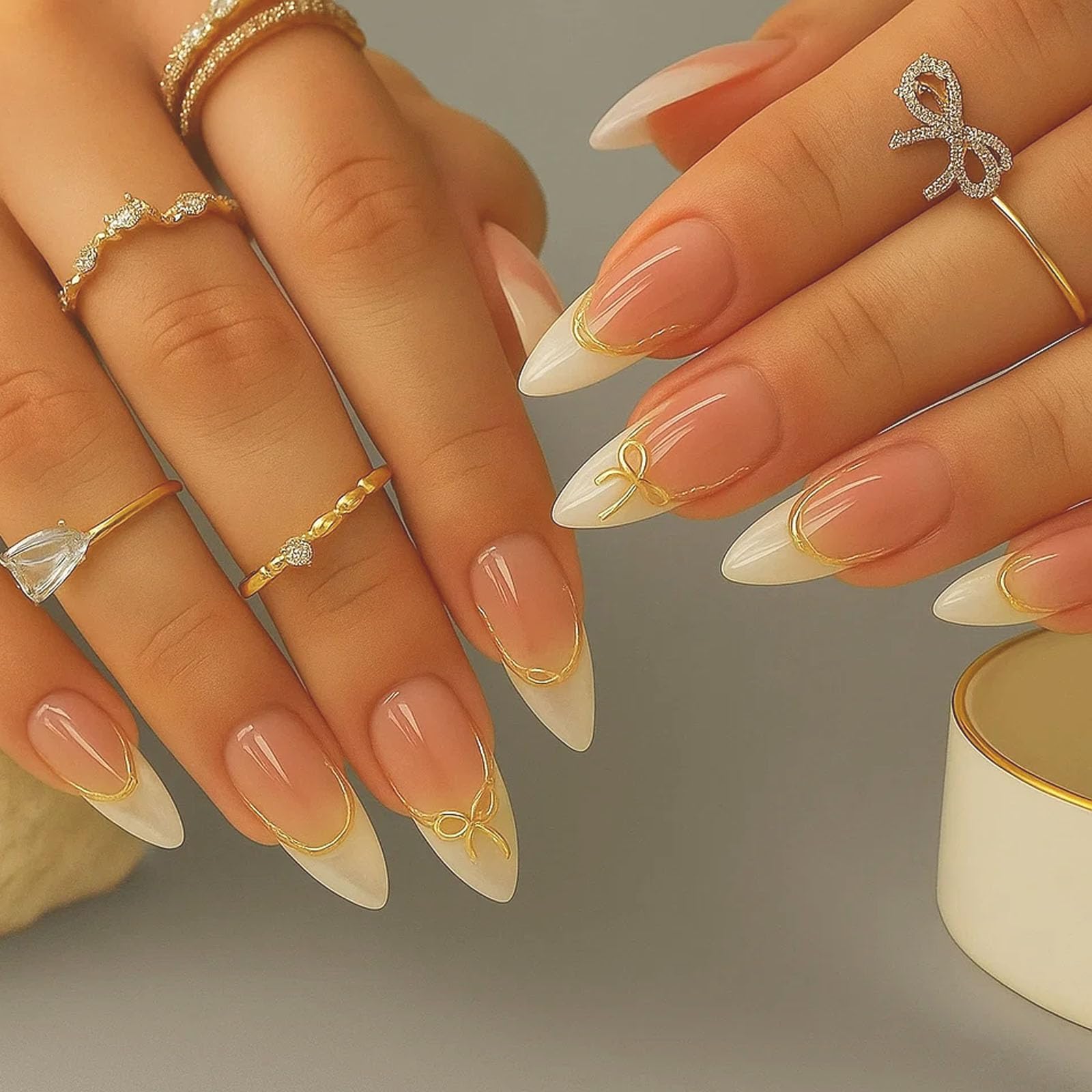 Almond Stiletto French Press-On Nails, Glossy Nude To White Gradient With Gold Bow & Line Detailing