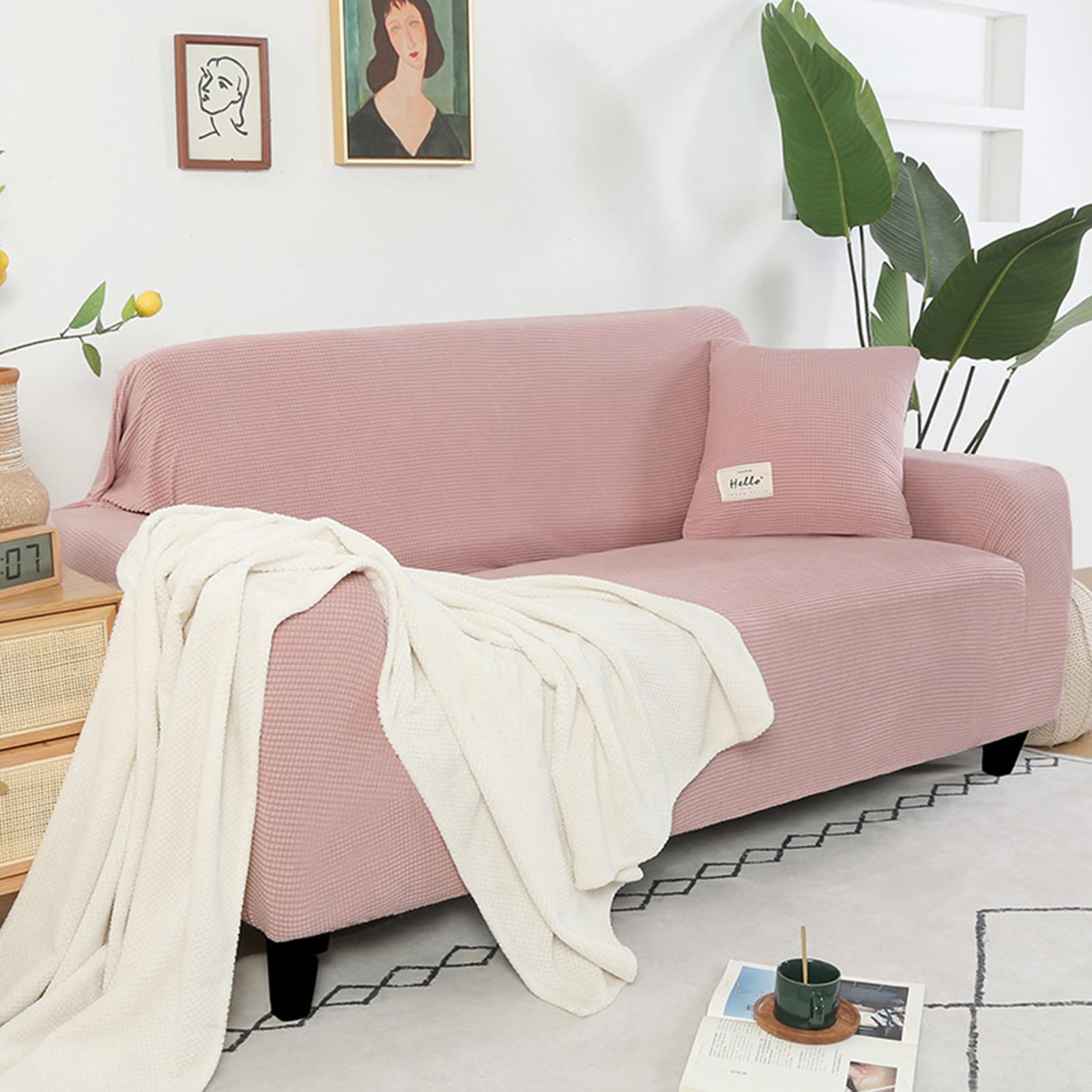Housse de canapé extensible antidérapante rose pour rénover un salon 3 places