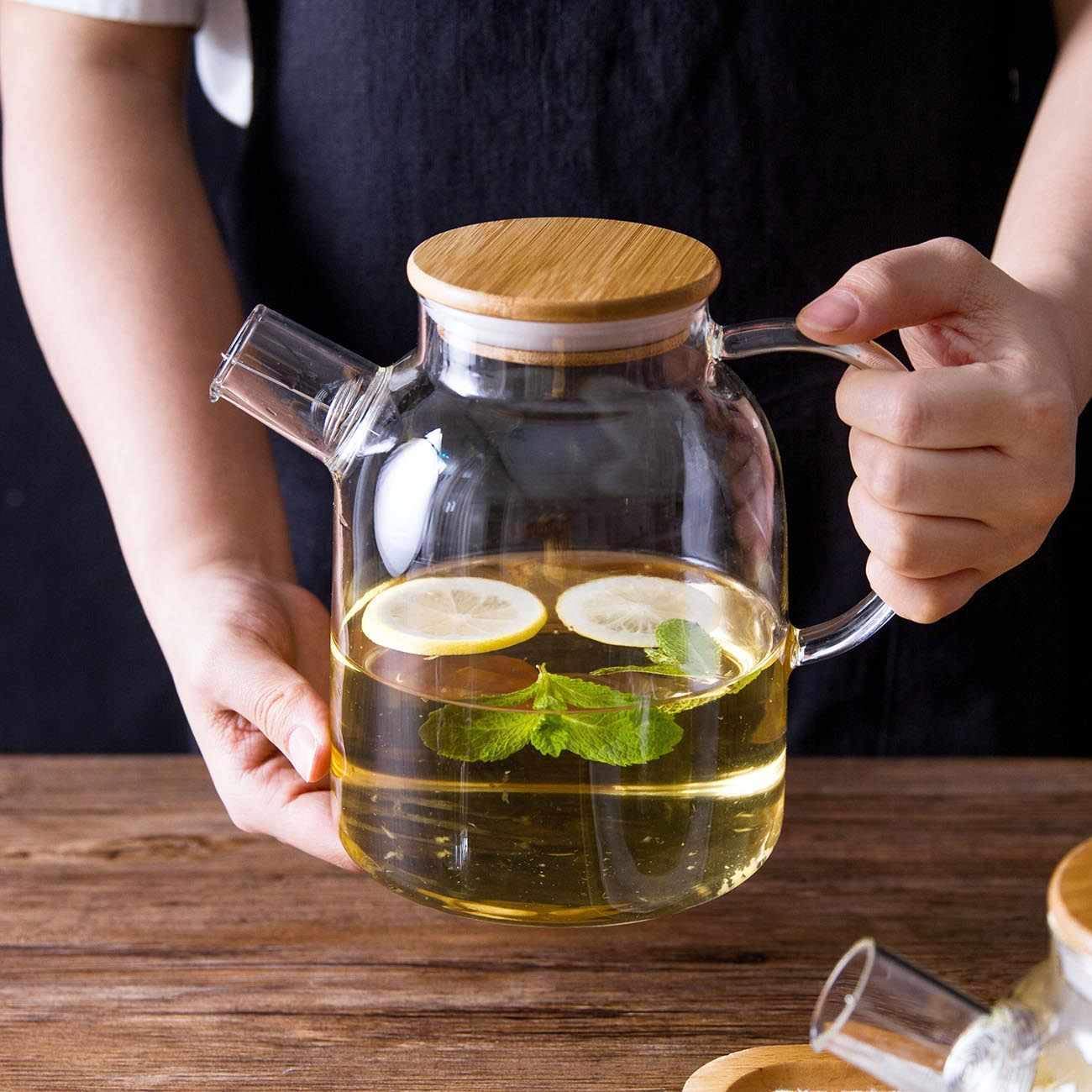 ROSEFINCH Glass Pitcher with Wooden Bamboo Lid and Golden Handle- 1.5 Litre - Glass Water Sun Tea Jar for - iced Tea, Juice, Milk, Coffee, Fruit Hot & Cold Beverages Carafe - Pack of 1, Clear.