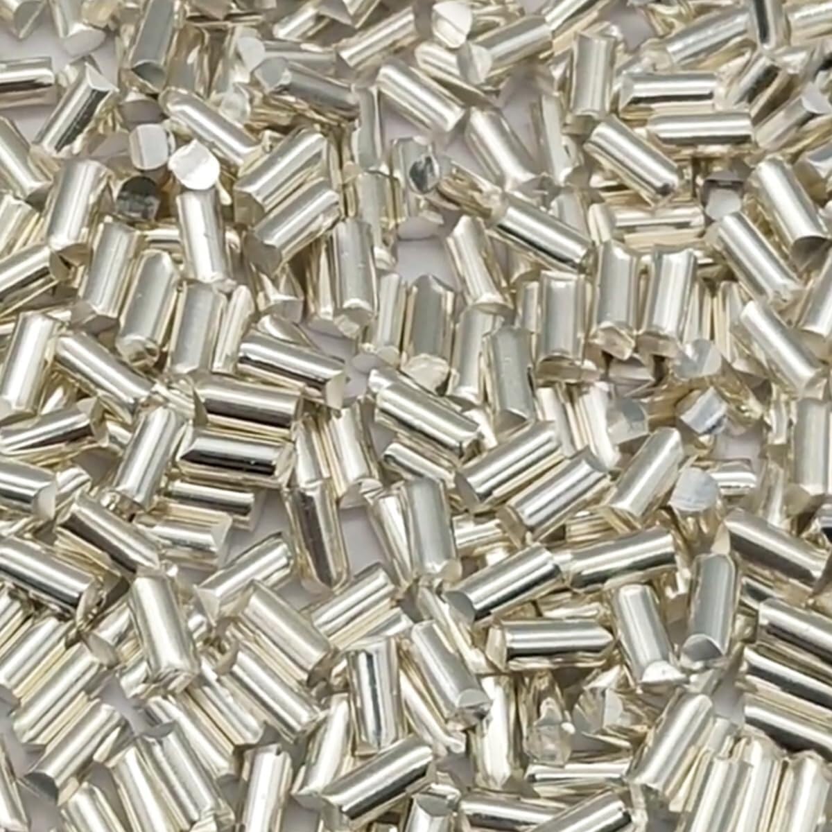 100 gramów srebrnych cząstek metalu - czystość 99,999%, 3 mm x 6 mm do powlekania próżniowego, badań laboratoryjnych, wyrobu biżuterii, elektroniki i nie tylko