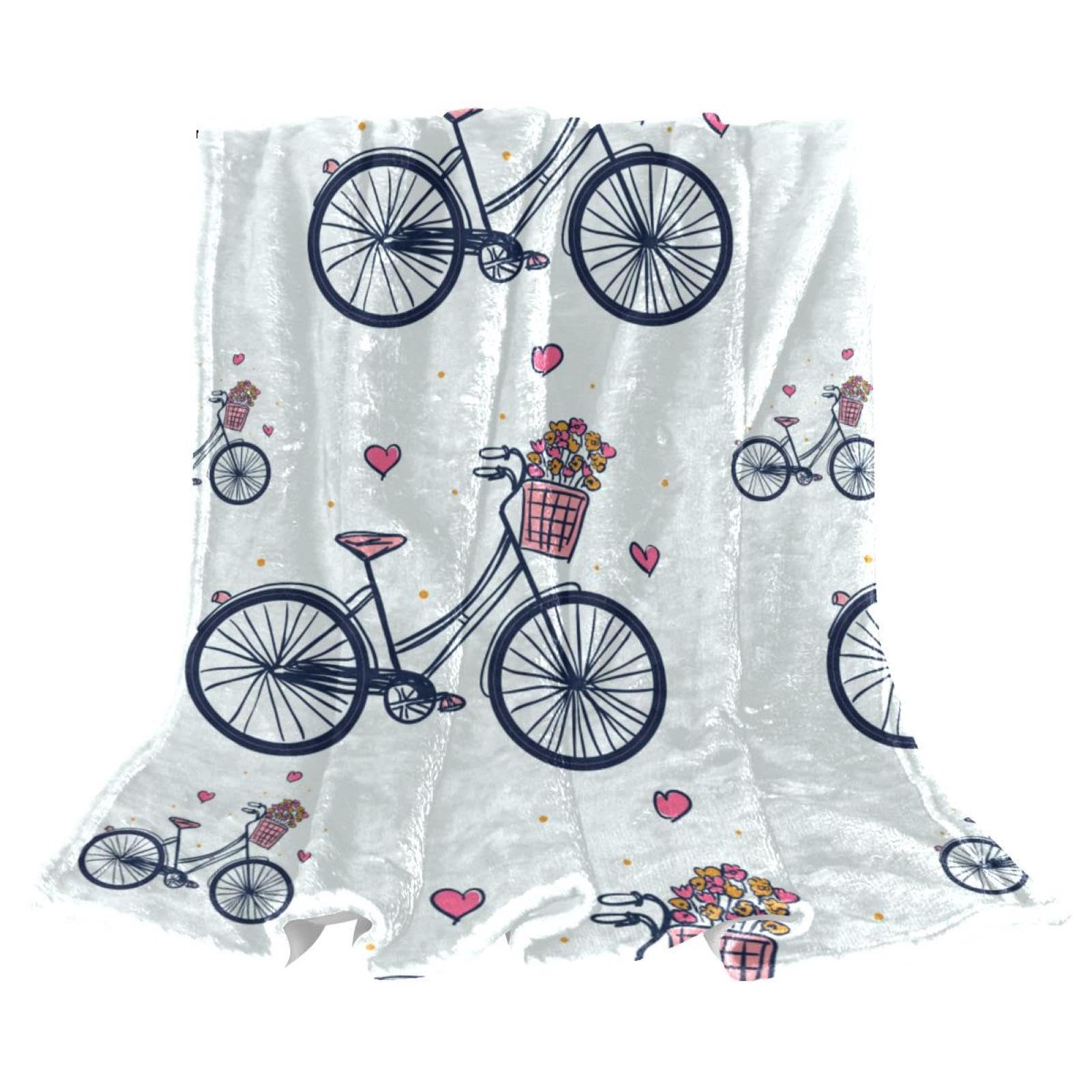 Couverture polaire bicyclette pour des soirées cocooning sur le canapé