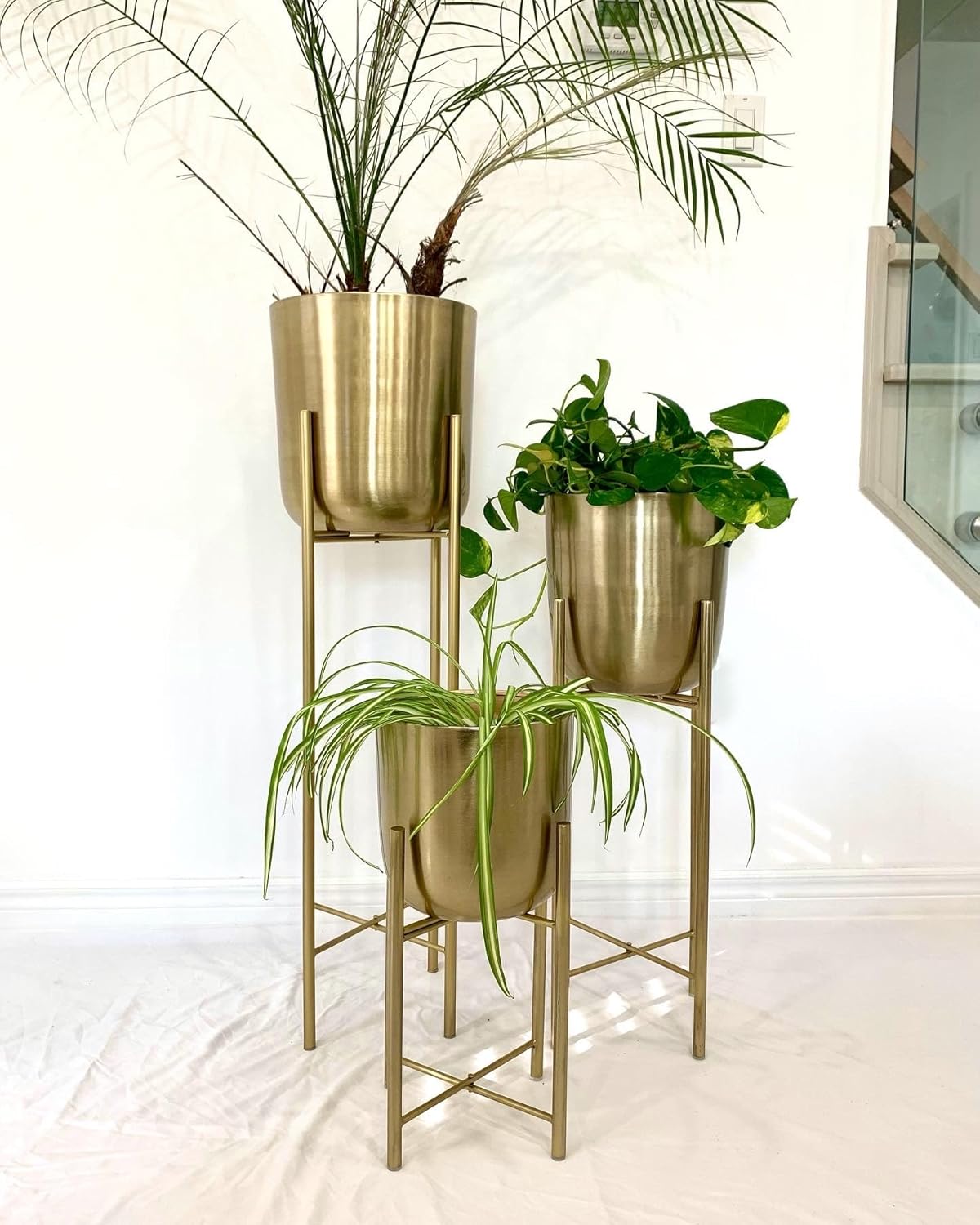 Classic Gold Metal Planters on Gold Legs (Set of 3)
