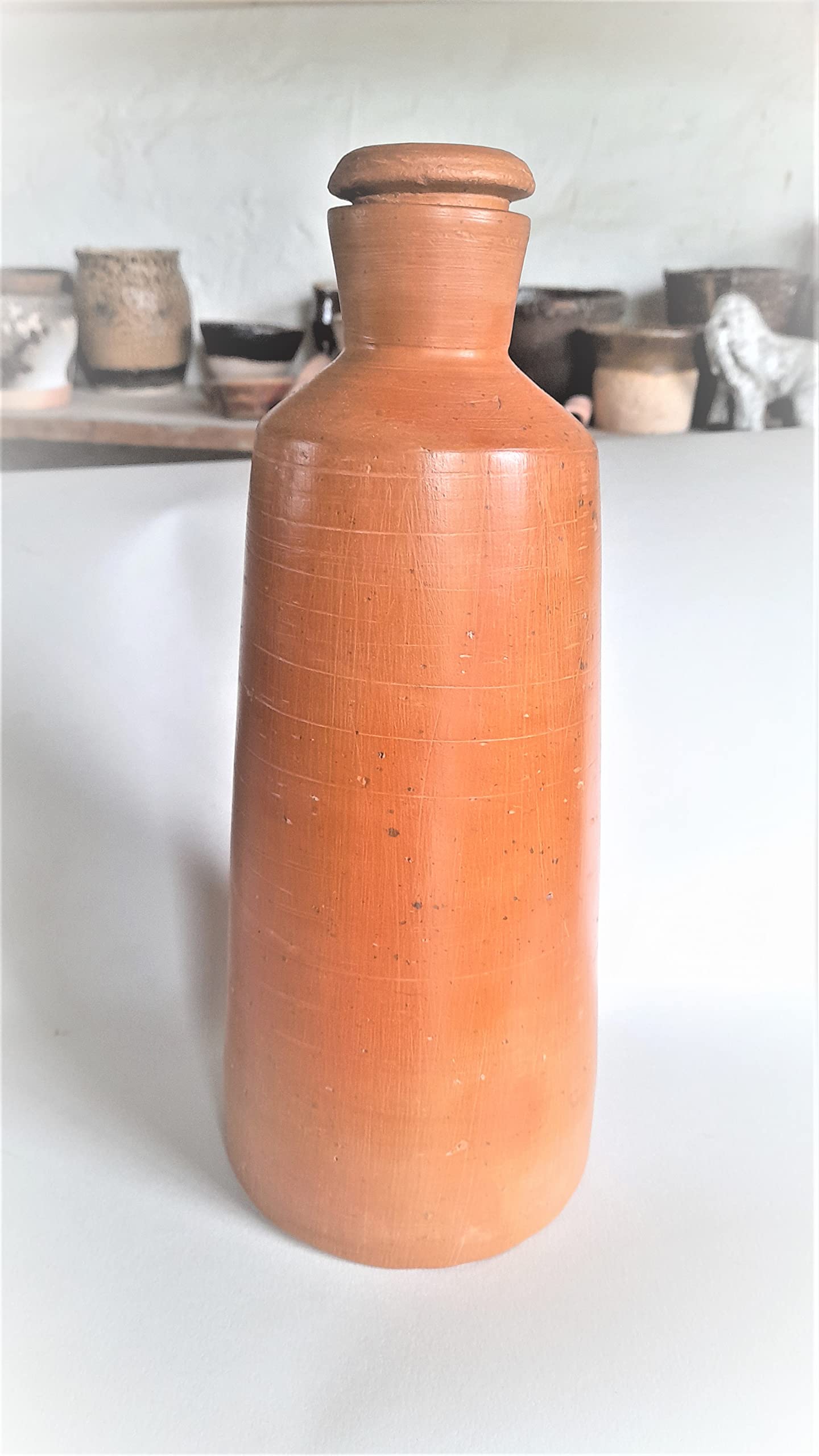 Terracotta Water Bottle for top of your working table, Organic Size (10"/ 4"-3"), Capacity : 1Ltr