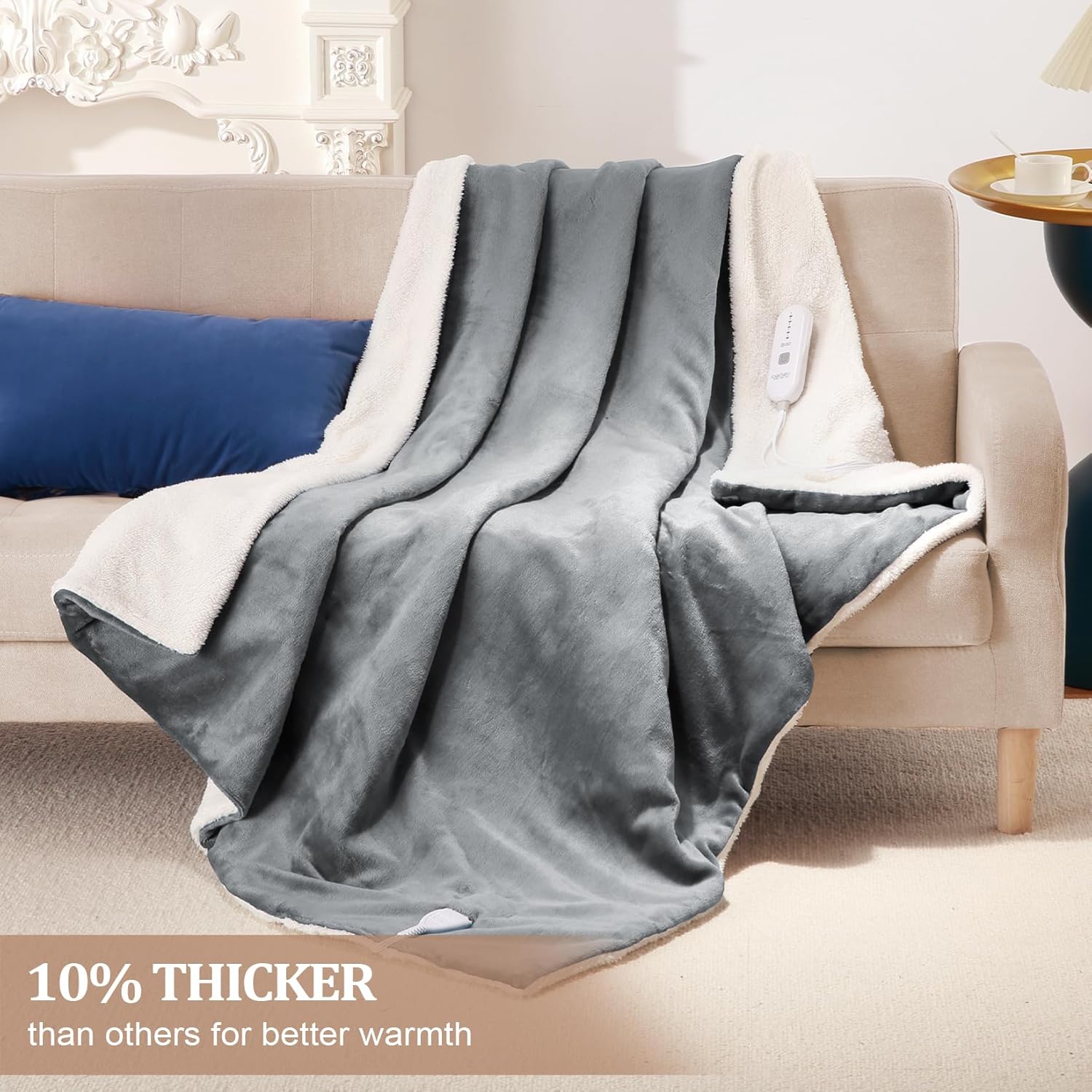 CAROMIO Heated Blanket draped over a couch