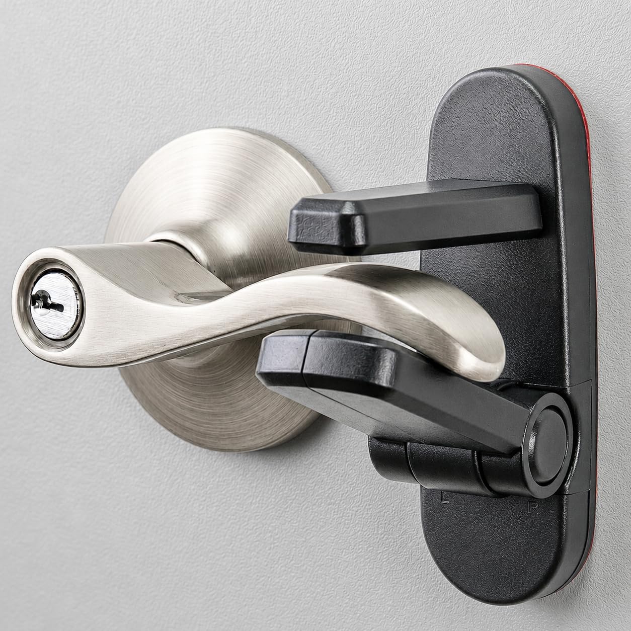 Photo 1 of Door Lever Lock (2 Pack) Prevents Toddlers from Opening Doors. 3.25" L * 1.5" W * 4.5" H Easy One Hand Operation for Adults. Durable ABS with 3M Adhesive Backing. Simple Install, Black