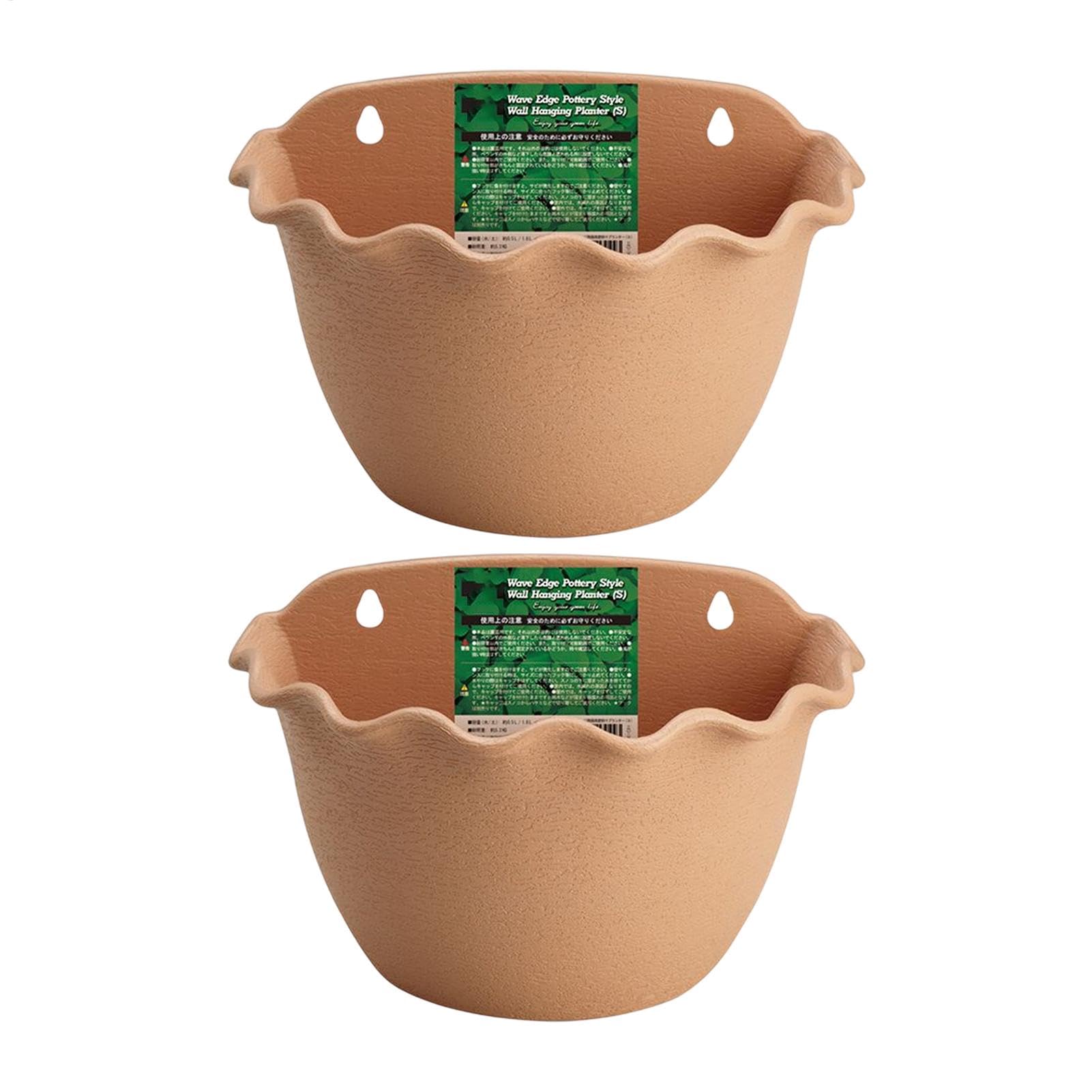 Pots de fleurs muraux d'intérieur pour végétaliser un petit balcon urbain
