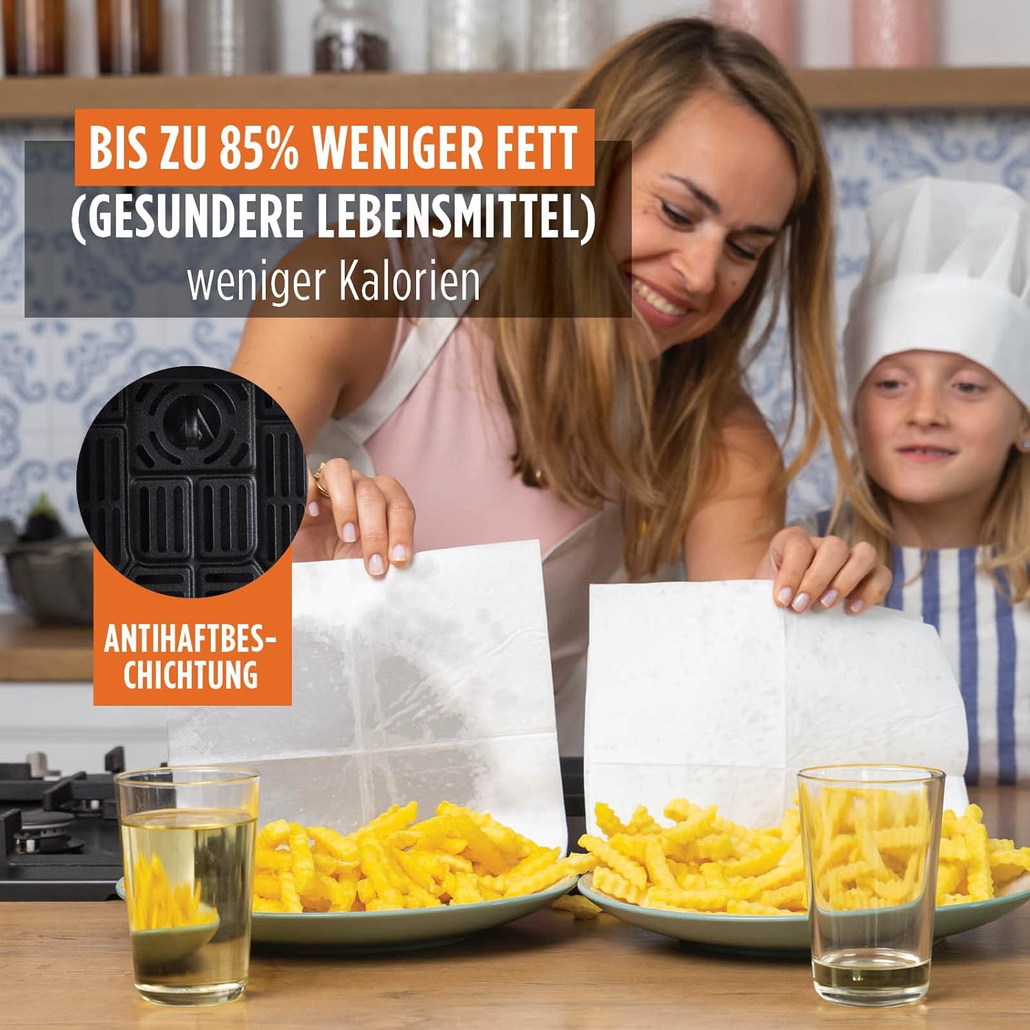 Woman and child preparing food with 85% less fat using the air fryer