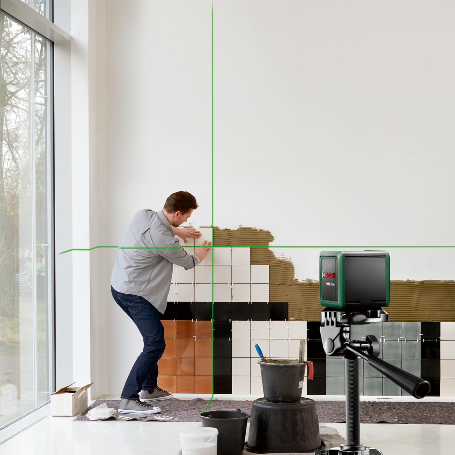 Bosch livella laser a croce Quigo Green con treppiede (laser verde per una migliore visibilità, involucro in plastica riciclata, in cartone)