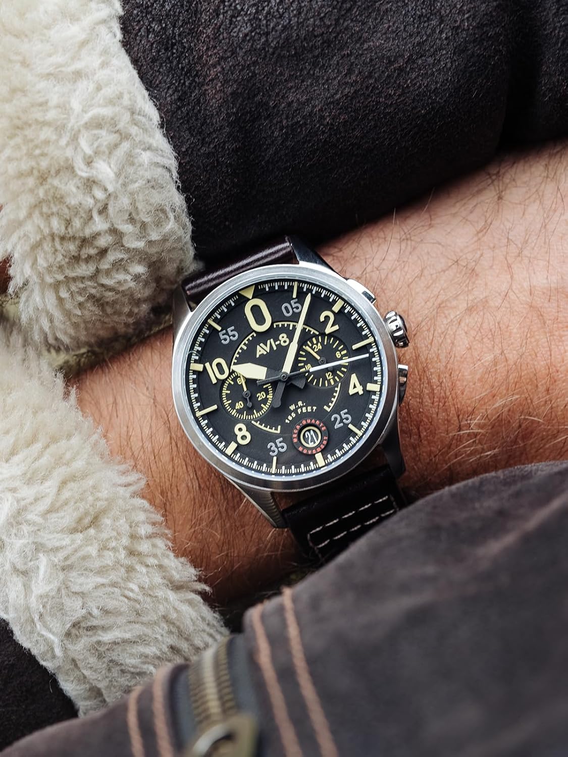 Close-up of the AVI-8 Spitfire Lock Chronograph watch dial showing the subdials and hands.