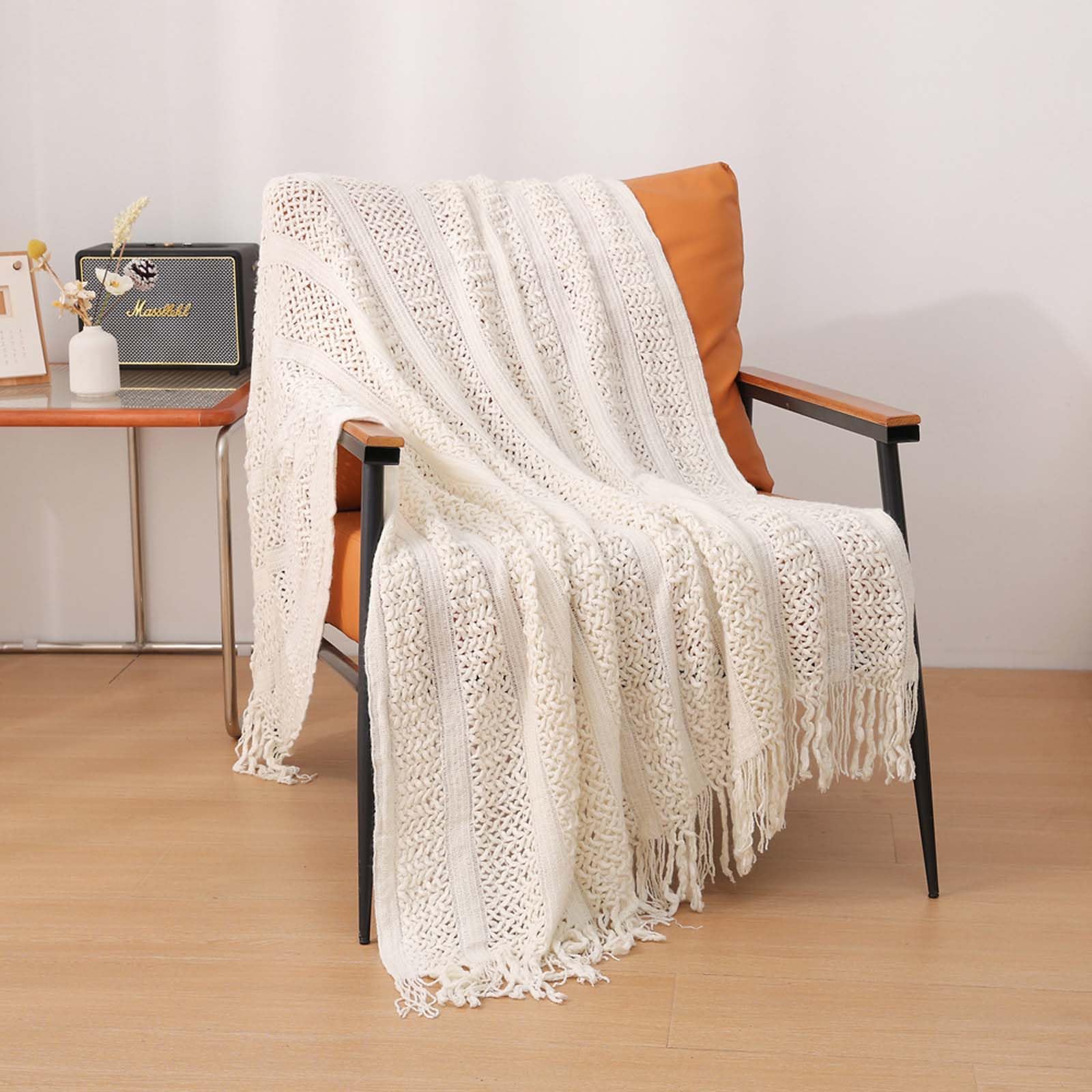 Plaid lit torsadé pour cocooning sur le canapé et siestes douces en chambre d'hôtel