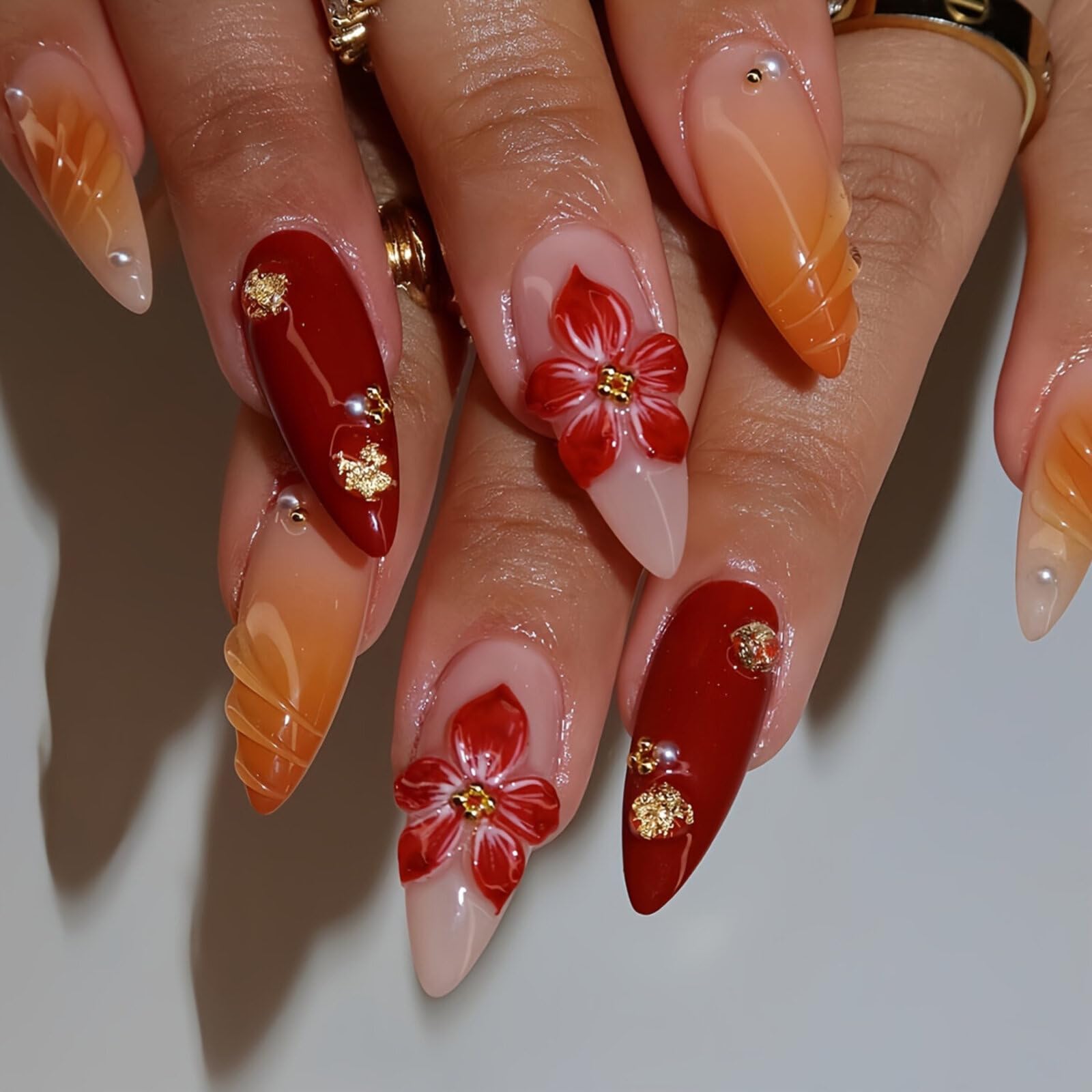 MIXFOSAHN Flower Press on Nails Medium Almond Fake Nails Red Orange with Gold Rhinestone Designs Embossed Flowers Glossy Stick on Nails Glue on Nails
