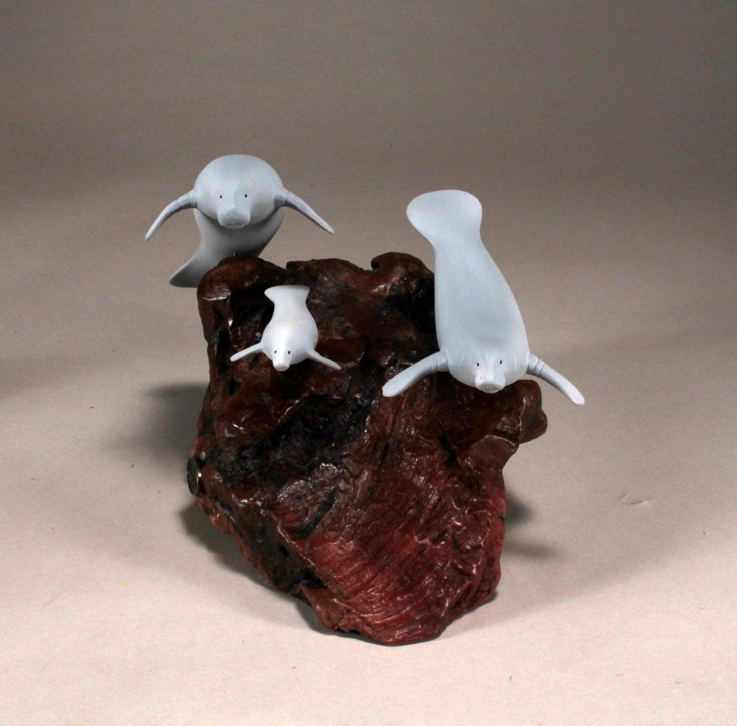 Manatee Family by John Perry Airbrushed 9 in Long on Polished burlwood Base. Signed.