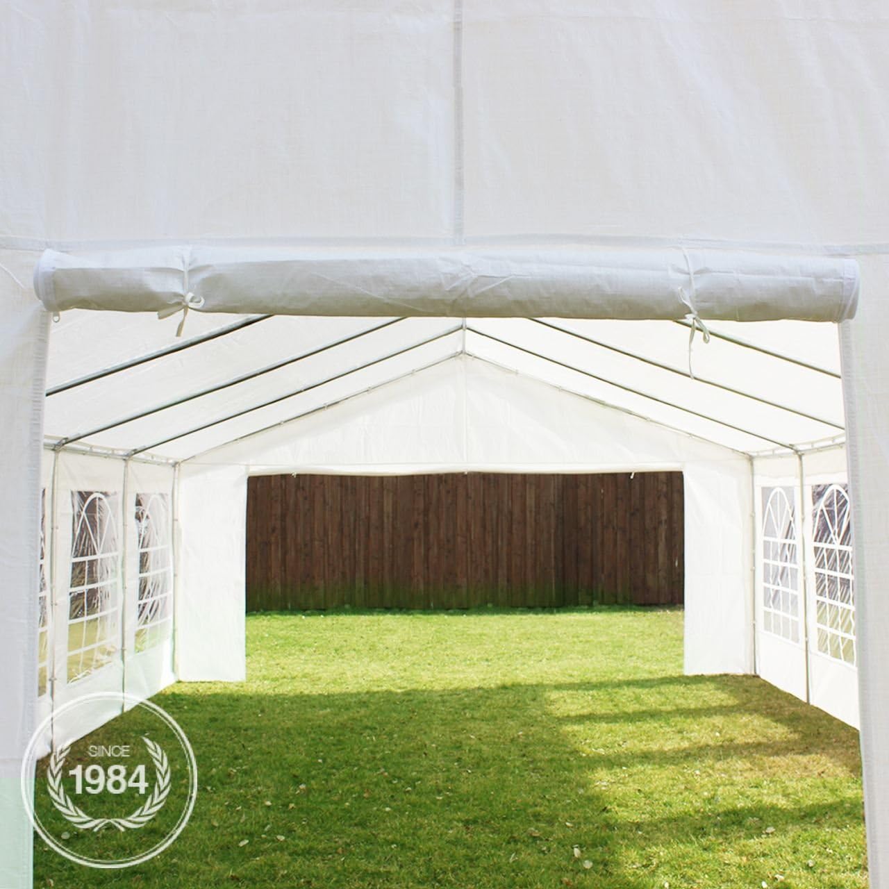 Tent entrance with rolled-up zippered door and bungee cords