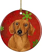 Vista 1 de Caroline's Treasures Dachshund copos de nieve rojos y verdes, adorno de cerámica de Navidad para colgar en el árbol de Navidad, decoración