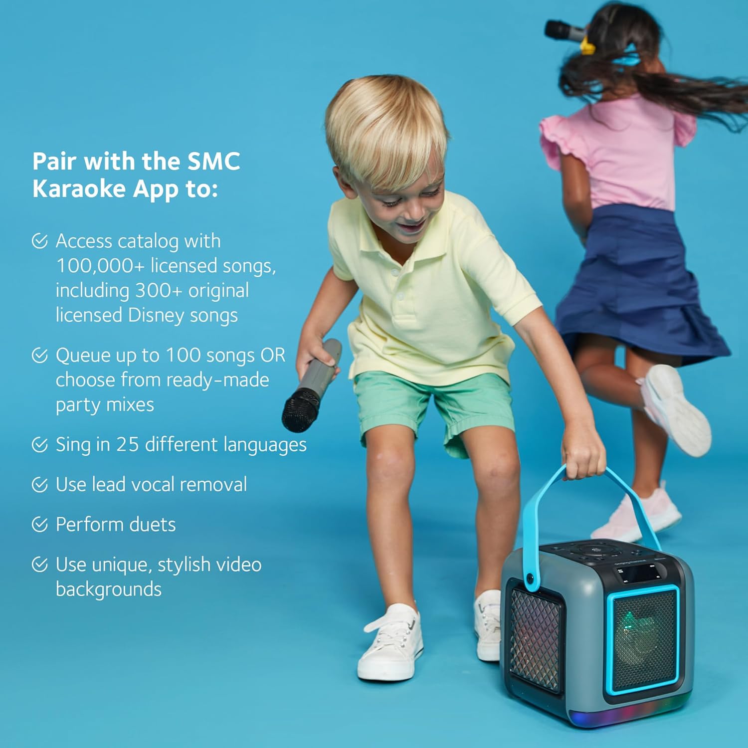 Children interacting with the Singing Machine Cube Mini and a smartphone displaying the Singing Machine App