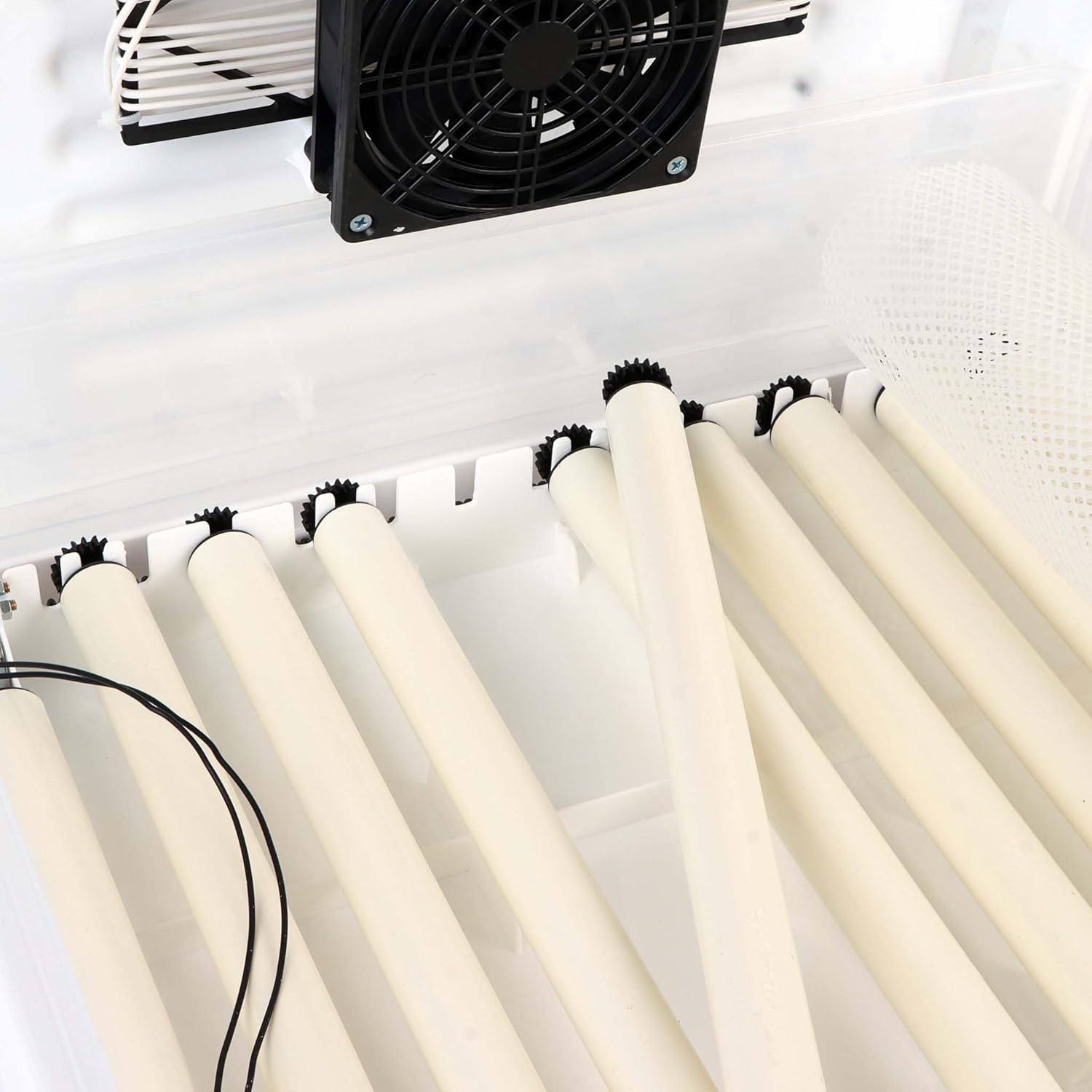 Close-up of egg rollers and internal fan