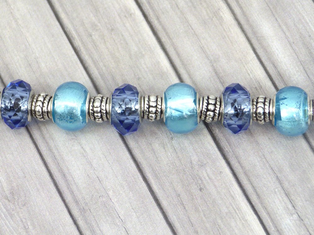 Pulsera Thurcolas Charms para mujer modelo Manhattan acero inoxidable con cuentas de vidrio azul