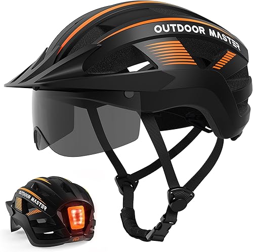 OutdoorMaster - Casco de bicicleta para adultos, con luz LED trasera recargable, gafas magnéticas desmontables, visera solar extraíble - Adecuado