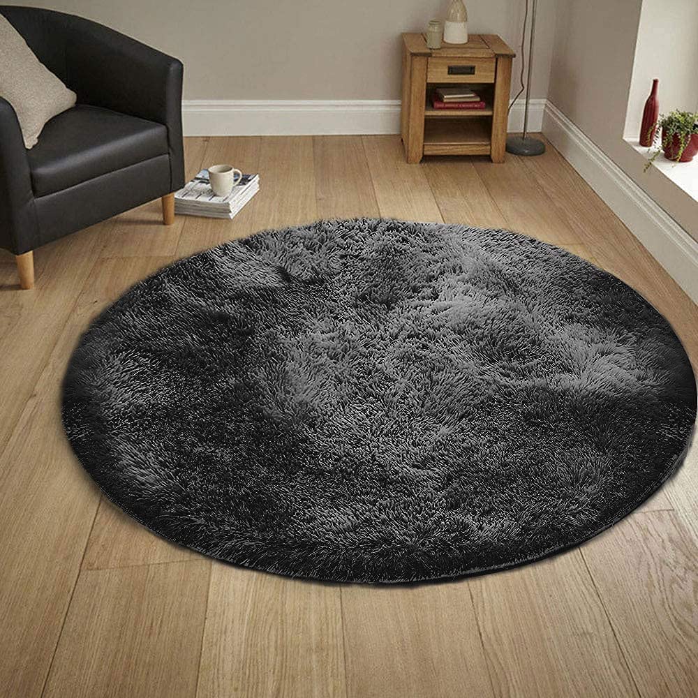 Tapis en peluche ronde noire 160cm idéal pour décorer le salon