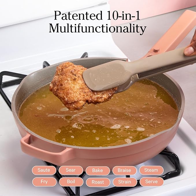 The Always Pan 2.0 is compatible with all types of cooktops, including induction, and is safe for use in ovens up to 232°C (450°F). It comes in a sophisticated "Spice" color, adding a pop of style to kitchen aesthetics. For ease of use, it includes a lid, steamer basket, and spatula, enhancing its multifunctionality. The pan’s thoughtful design and practical features make it a popular choice for home cooks looking to streamline their cookware collection.