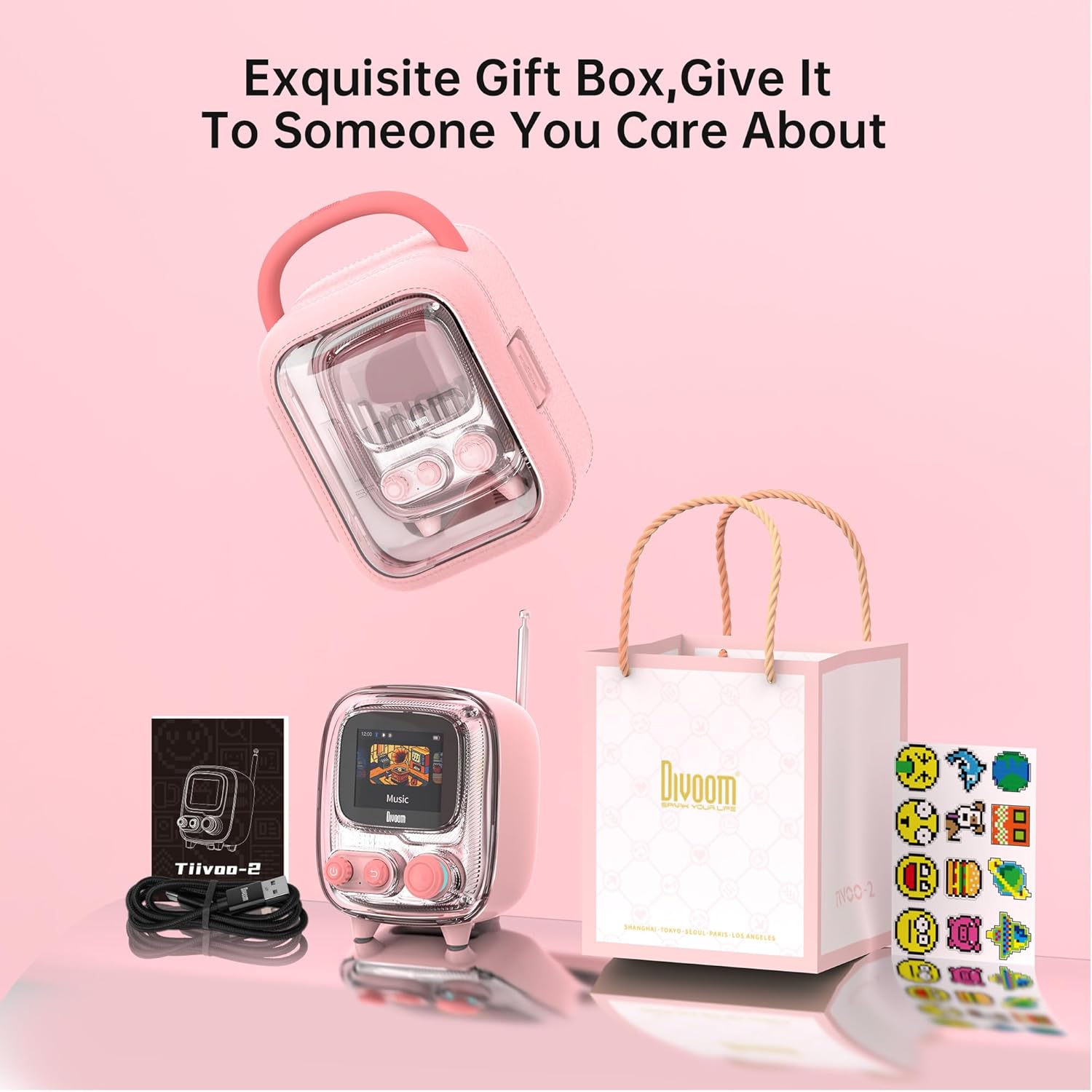 The Divoom Tiivoo-2 speaker packaged in an exquisite gift box, accompanied by a gift bag and pixel art stickers, emphasizing its suitability as a personalized gift.