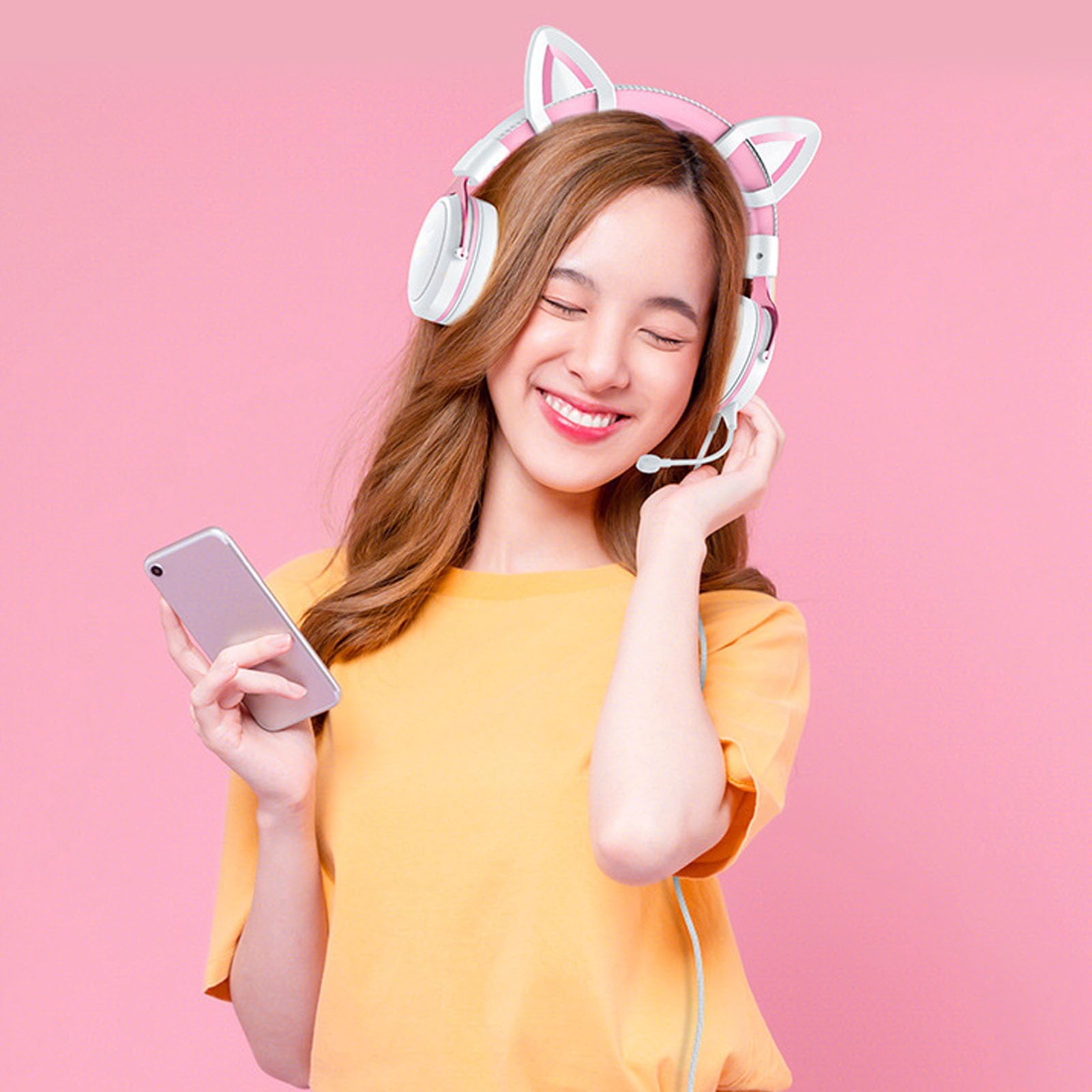 Sxhlseller Casque de Jeu Filaire pour PC avec écouteurs Lumineux RVB, Microphone à Réduction de Bruit Réglable pour Un Son Clair, Décor Oreilles de Chat Blanc Rose, Confort en Mousse à Mémoire de