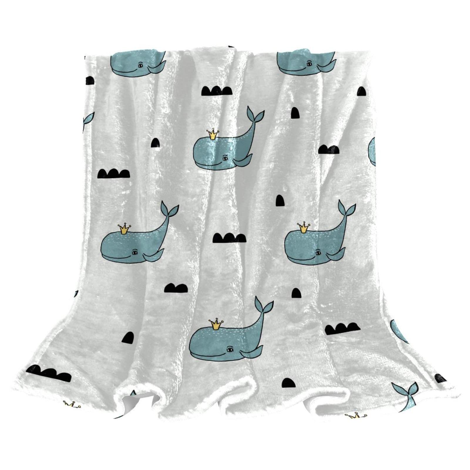 Couverture polaire baleine douce pour piquer une sieste cocooning sur votre canapé