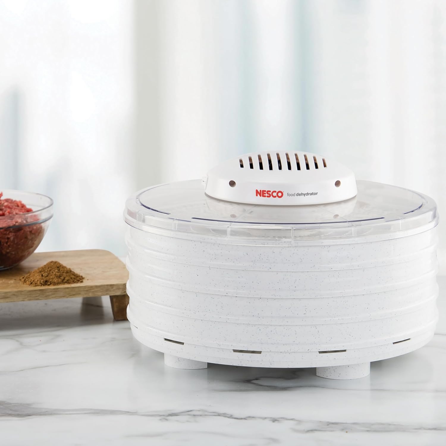 Assembled NESCO FD-37 Food Dehydrator with clear top and powerhead