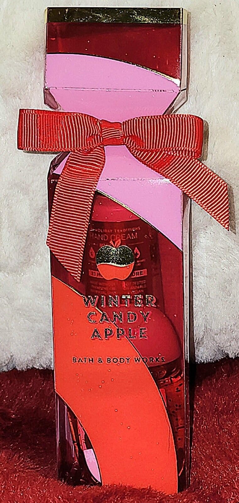 Bath & Body Works Winter Candy Apple Travel Gift Set - Includes a hand gel (1 fl oz) and hand cream (1 fl oz) arranged inside a small decorative gift box.