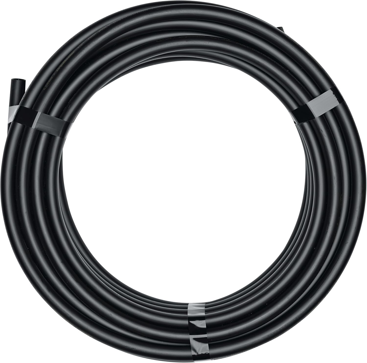 Roll of black drip irrigation tubing