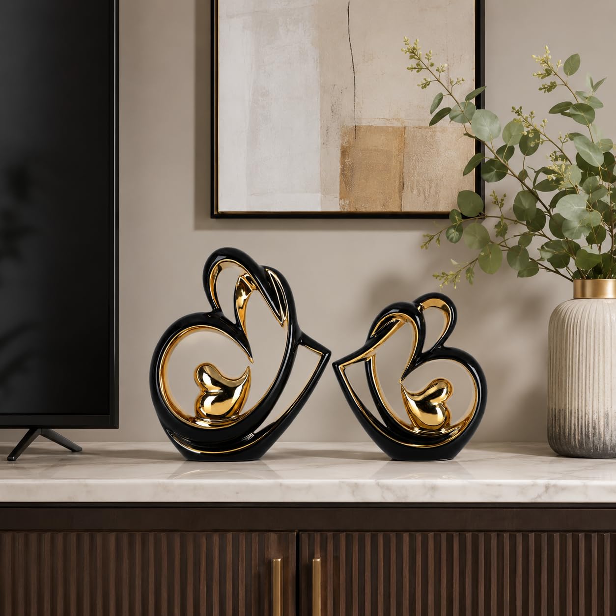 DOVDOV Statue en céramique double cœur noir et or, sculpture d'amour moderne avec design creux abstrait, figurine décorative pour couple, salon, chambre, bureau, mariage