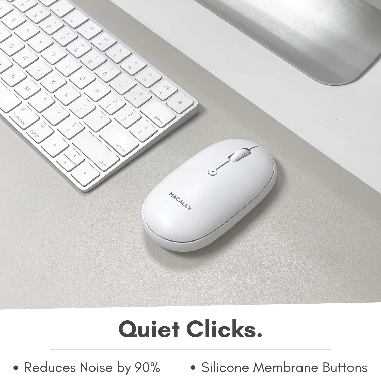 Macally Wireless Bluetooth Mouse on a desk next to a keyboard, highlighting its quiet operation.